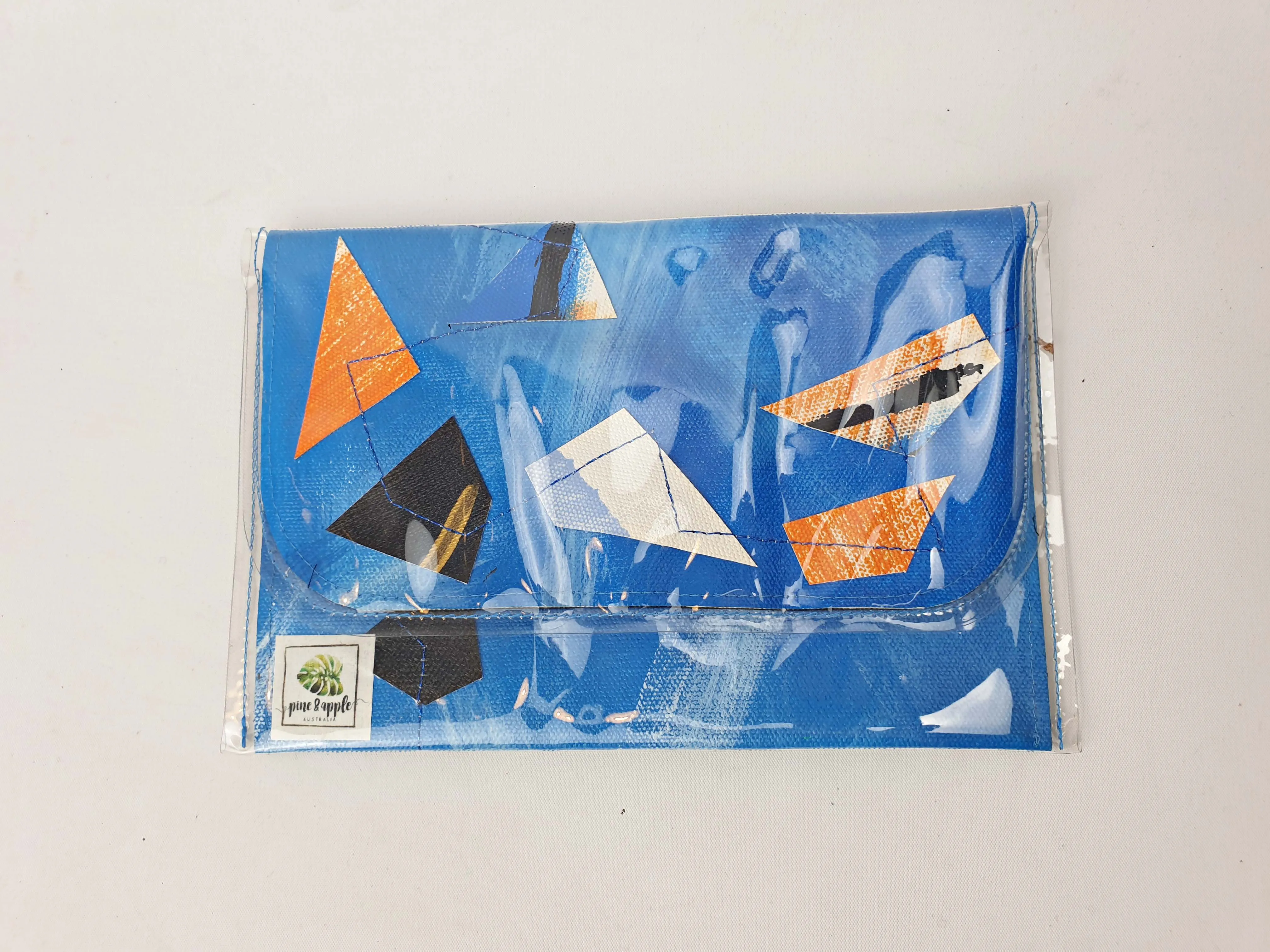 Pine & Apple blue plastic covered clutch